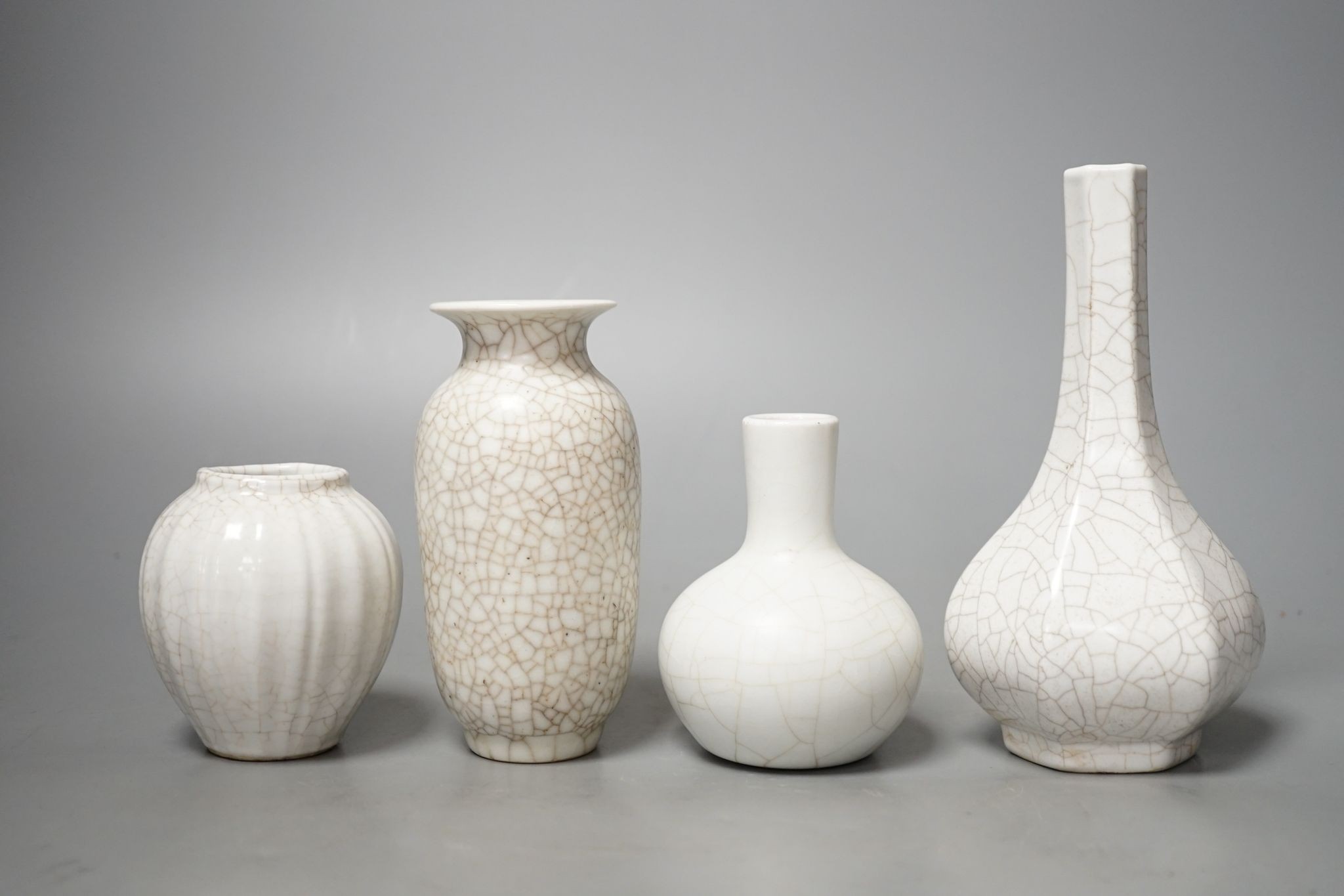 Four Chinese crackle glaze vases, tallest 16 cms high.